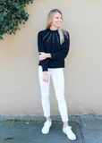 The most chic sweater for fall + winter, this top has coastal granddaughter written all over it. Knitted pullover with pearl embellishments, it is ultra soft and so easy to dress up or down. Pair with white denim and sneakers for an everyday put together look or pair it with a silk midi skirt and heels to take it out on date night! Either way you are sure to look chic! 