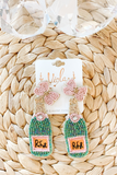 We will take any opportunity to pop some bottles of champagne y'all. And.. now you have the perfect earrings for the occasion! These Rose pink and orange seed beaded earrings feature a felt back, sewn bead details. 