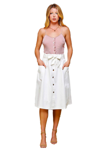 - Pleated A line paperbag knee length skirt  - 2 front pockets  - Belt tie with belt loops  - Button trims in front  - Model in white is 5' 8" 34-24-34 and wearing a Small      -Handmade     -Social Good     -Women Owned