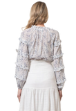 - blue and white floral printed - tiered long sleeves - ruffle detailing -pleating -front v neckline split   This brand is... -Social Good -Women Owned 