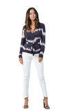 Get polished and feminine in tie dye trend!Comfortable shirt with a lot of stretch.  The shirred side wrap top is flattering on all body types.  Note: the belt is not included. This brand is... -Handmade -Women Owned -Small Batch 