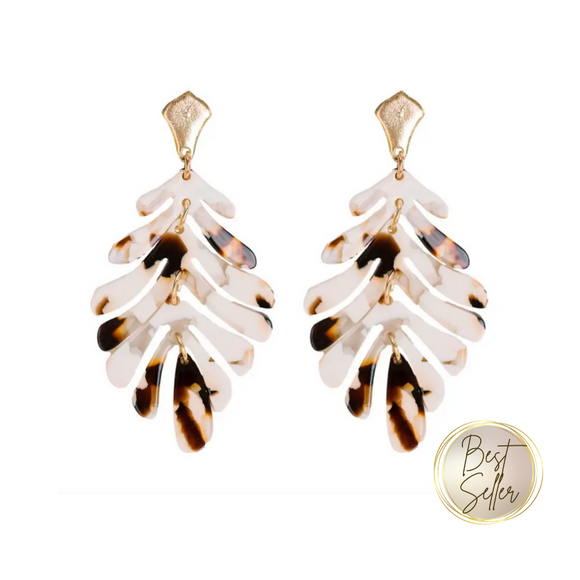 Guess who's back?! These best selling lightweight earrings are the perfect fun neutral pop to any outfit! Grab them while they last because they flew out of stock last time!  These drop earrings in an acrylic leaf design are light weight and so chic! Pair with a girls night outfit or to the office for a feminine touch. 