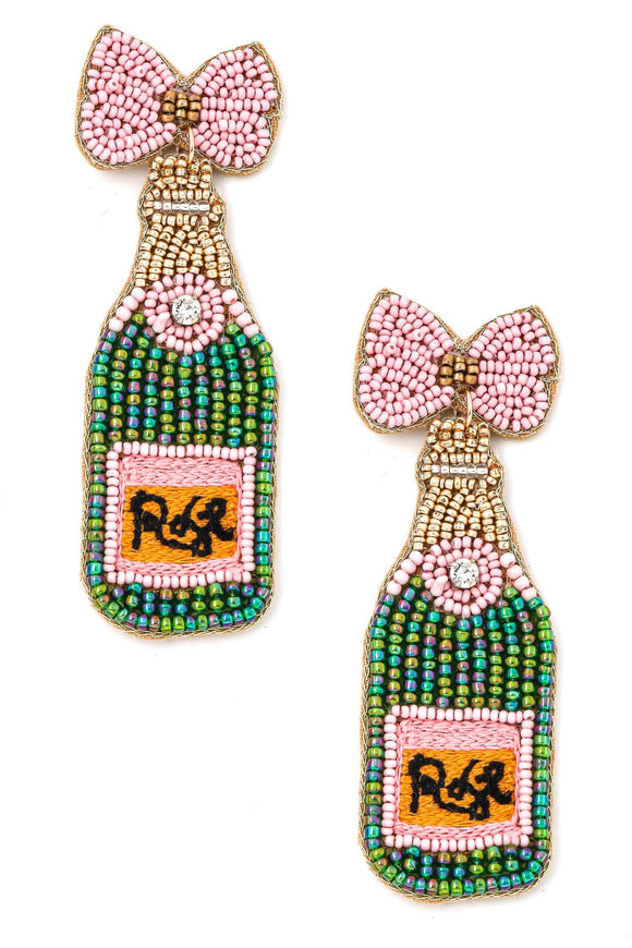 We will take any opportunity to pop some bottles of champagne y'all. And.. now you have the perfect earrings for the occasion! These Rose pink and orange seed beaded earrings feature a felt back, sewn bead details. 